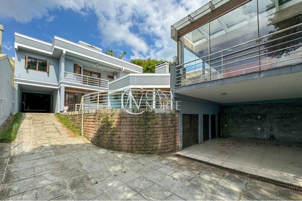 Casa à venda com 4 quartos, 435m², 4 suítes, 6 vagas, Tocantins no bairro Lomba do Pinheiro em Porto Alegre
