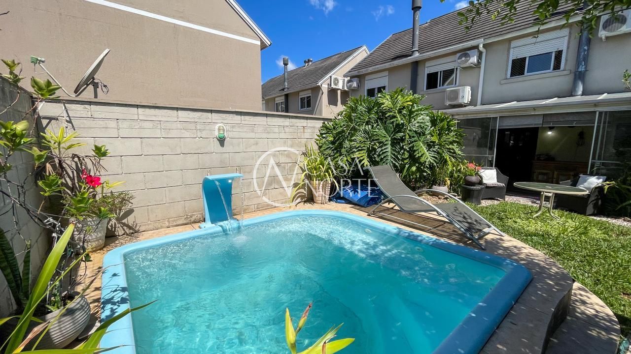 Casa de Condomínio à venda com 4 quartos, 194m², 1 suíte, 2 vagas, Rua Augusto Attílio Giordani no bairro Jardim Lindóia em Porto Alegre