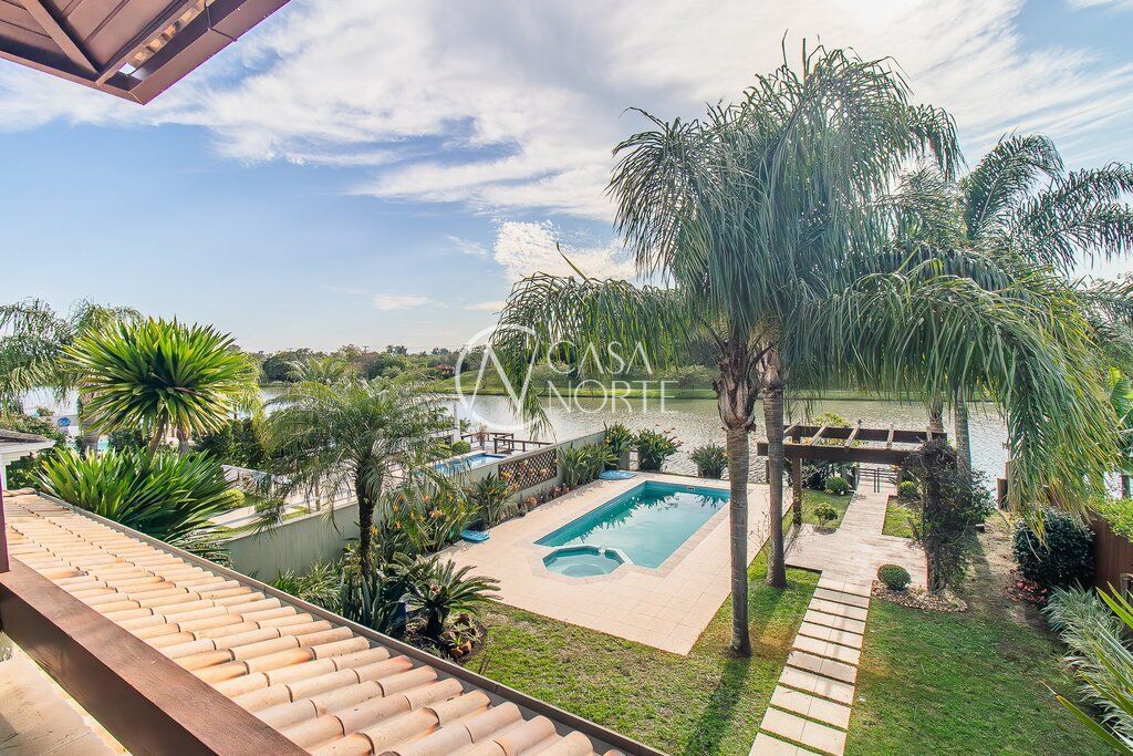 Casa de Condomínio à venda com 4 quartos, 387m², 4 suítes, 2 vagas, Juca Batista no bairro Belém Novo em Porto Alegre