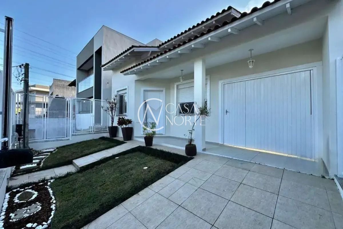 Casa de Condomínio à venda com 3 quartos, 112m², 1 suíte, 2 vagas, Rua Arahy Borges Ortiz no bairro Mário Quintana em Porto Alegre
