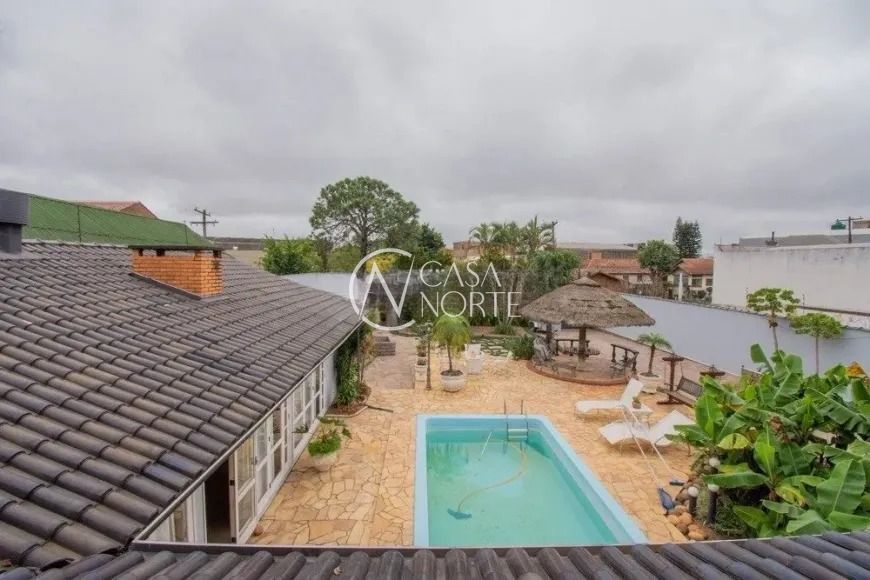 Casa à venda com 3 quartos, 450m², 1 suíte, 3 vagas, Rua Pedro Lessa no bairro Jardim Floresta em Porto Alegre