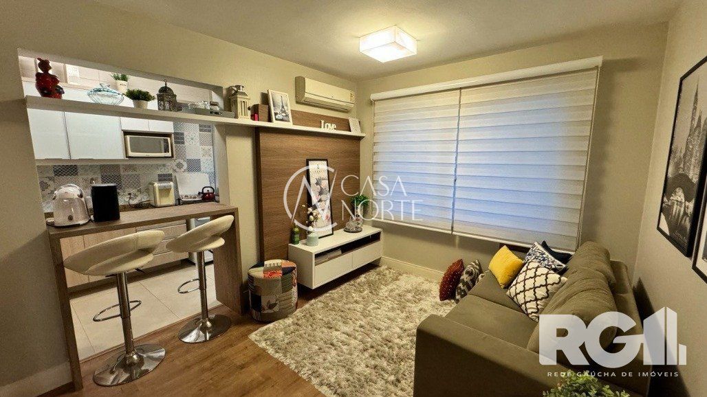 Apartamento à venda com 1 quarto, 52m², 1 suíte, 1 vaga, Avenida Mariland no bairro Auxiliadora em Porto Alegre