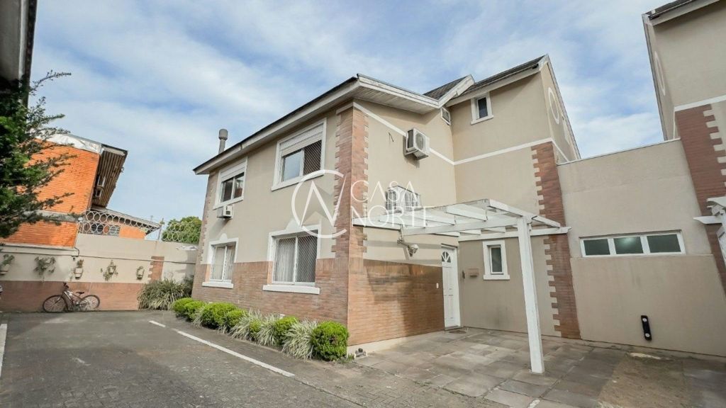 Casa de Condomínio à venda com 3 quartos, 146m², 1 suíte, 2 vagas, Rua Augusto Attílio Giordani no bairro Jardim Lindóia em Porto Alegre