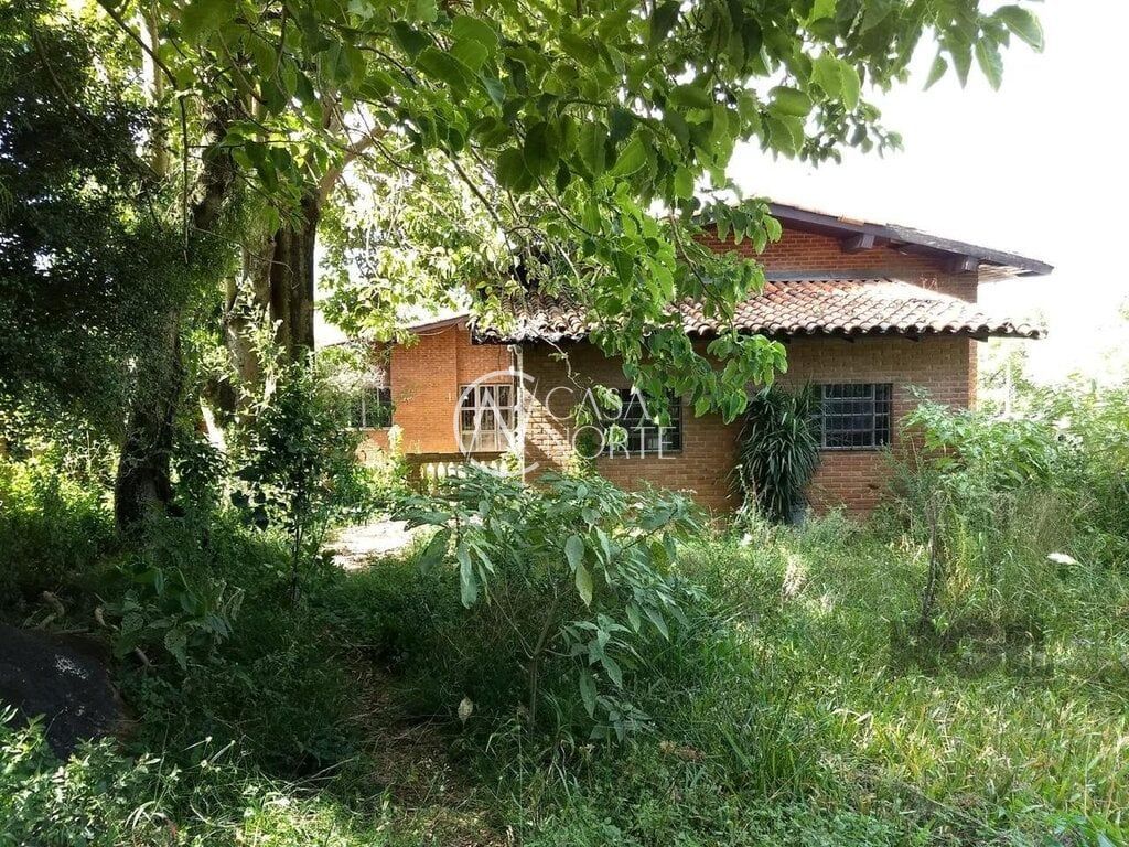 Casa à venda com 3 quartos, 300m², 3 vagas, Rua Cleveland no bairro Santa Tereza em Porto Alegre
