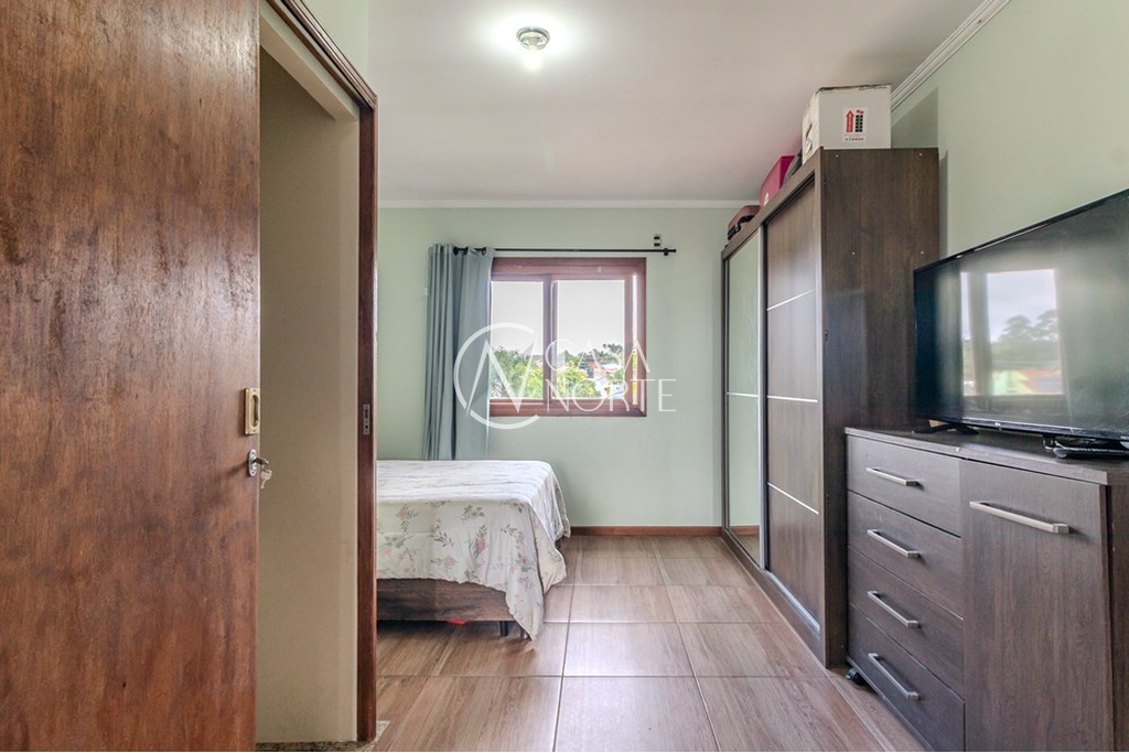 Casa à venda com 3 quartos, 156m², 2 suítes, 2 vagas, Hugo Nelson Magalhães no bairro Rubem Berta em Porto Alegre