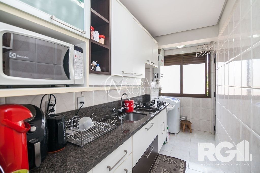 Apartamento à venda com 3 quartos, 82m², 1 suíte, 2 vagas, Rua Roque Calage no bairro Passo da Areia em Porto Alegre