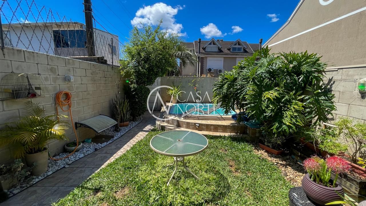 Casa de Condomínio à venda com 4 quartos, 194m², 1 suíte, 2 vagas, Rua Augusto Attílio Giordani no bairro Jardim Lindóia em Porto Alegre