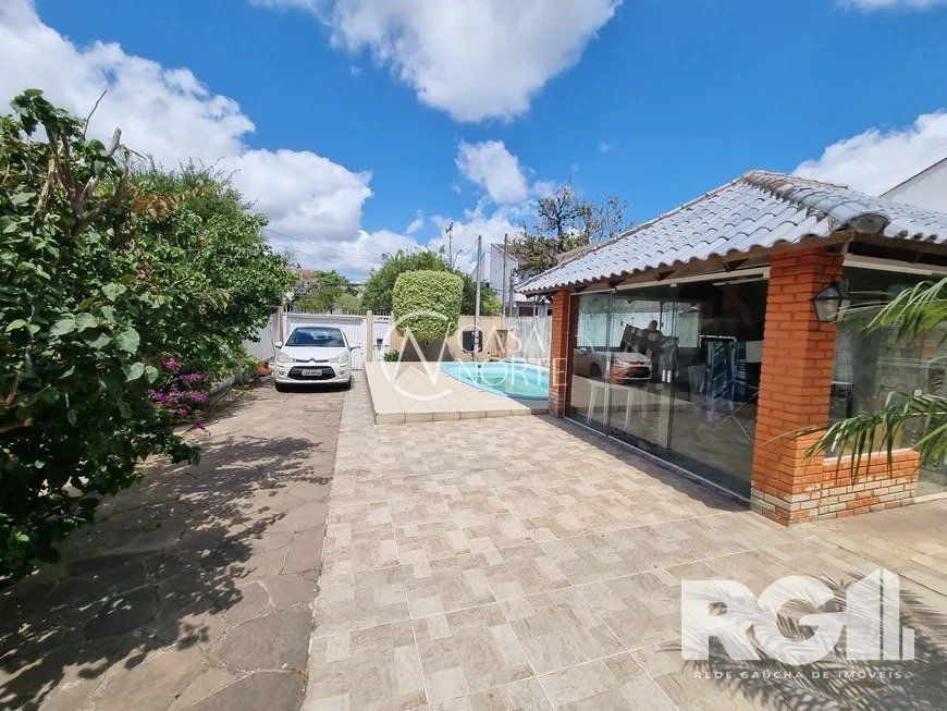 Casa à venda com 3 quartos, 150m², 1 suíte, 4 vagas, Rua Coronel João Pacheco de Freitas no bairro Jardim Itu em Porto Alegre