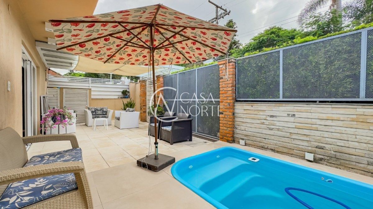 Casa à venda com 4 quartos, 357m², 3 suítes, 3 vagas, Rua Monte Alverne no bairro Chácara das Pedras em Porto Alegre