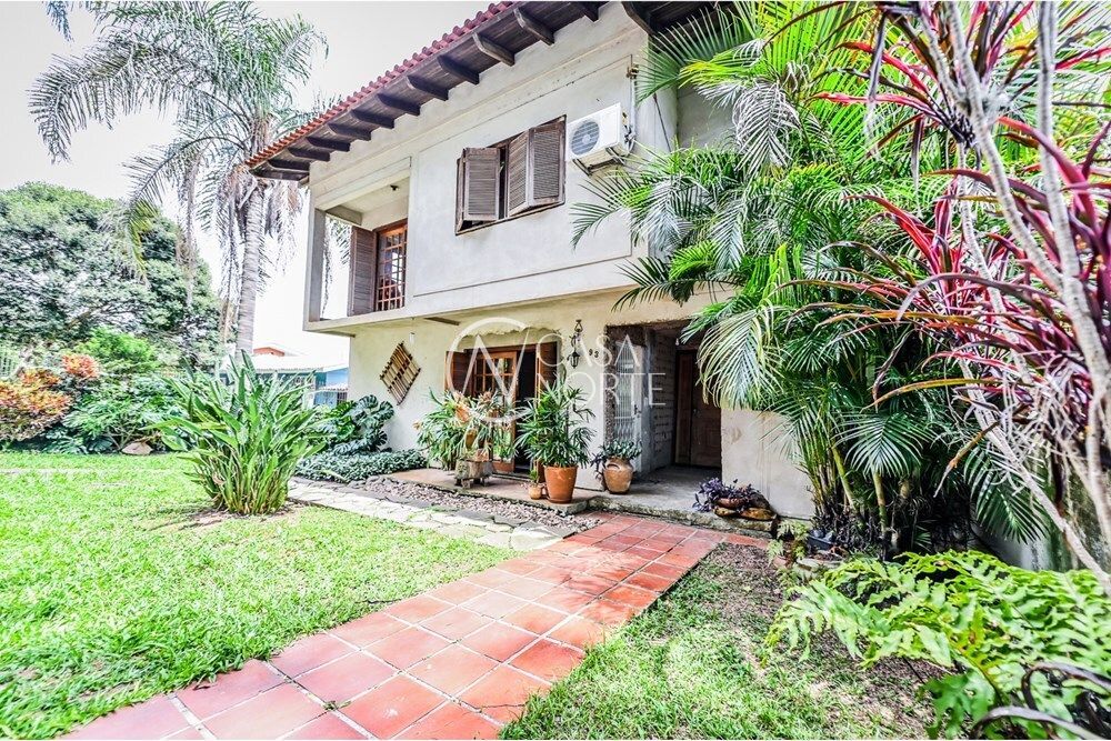 Casa de Condomínio à venda com 4 quartos, 231m², 1 suíte, 1 vaga, Das Orquídeas no bairro Santa Tereza em Porto Alegre