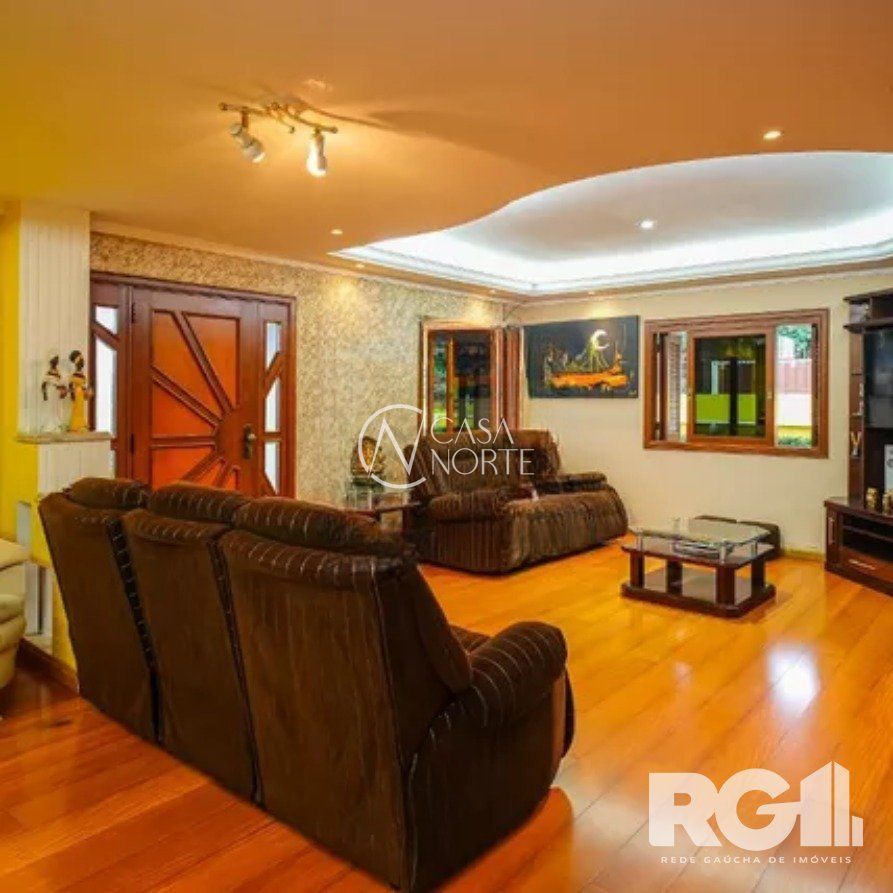 Casa à venda com 4 quartos, 530m², 3 suítes, 3 vagas, Rua Maria Elaine Wotter no bairro Parque Santa Fé em Porto Alegre