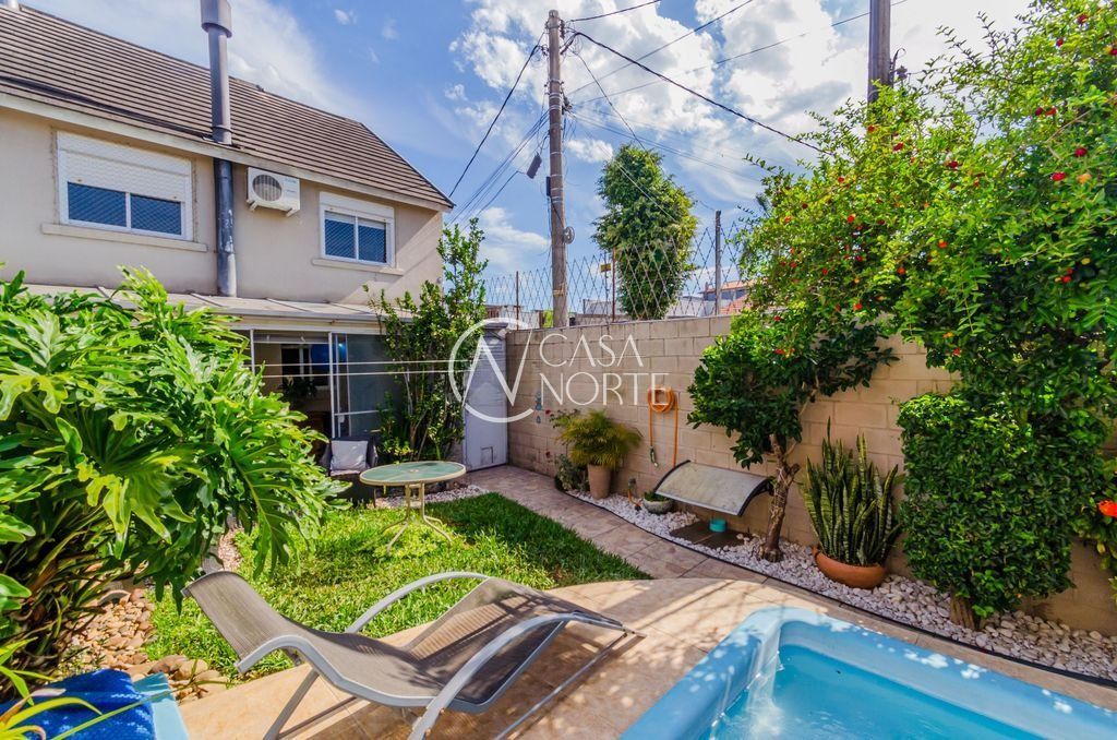 Casa de Condomínio à venda com 3 quartos, 194m², 1 suíte, 2 vagas, Rua Augusto Attílio Giordani no bairro Jardim Floresta em Porto Alegre