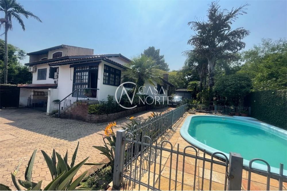 Casa à venda com 4 quartos, 525m², 1 suíte, 5 vagas, Pedro A. A. de Freitas Filho no bairro Jardim Sabará em Porto Alegre