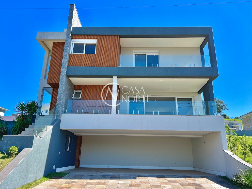 Casa de Condomínio à venda com 4 quartos, 375m², 4 suítes, 3 vagas, Estrada das Três Meninas no bairro Vila Nova em Porto Alegre
