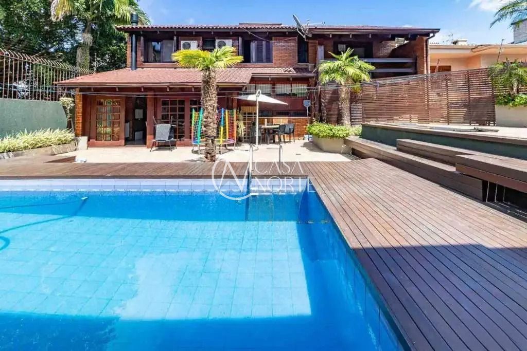Casa à venda com 4 quartos, 330m², 1 suíte, 4 vagas, Rua Walir Zottis no bairro Jardim Itu em Porto Alegre