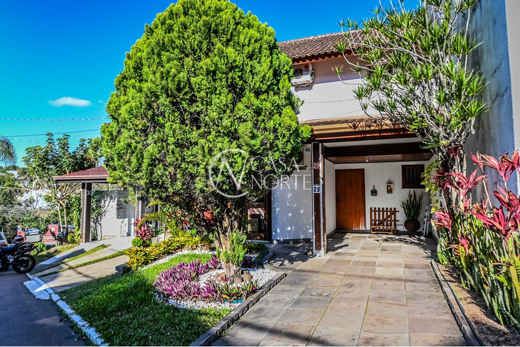 Casa de Condomínio à venda com 3 quartos, 106m², 1 suíte, 2 vagas, Avenida Eduardo Prado no bairro Cavalhada em Porto Alegre