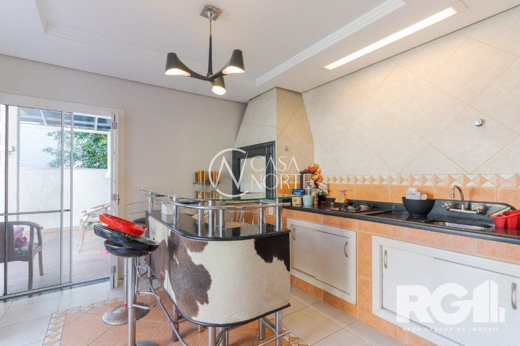 Casa de Condomínio à venda com 3 quartos, 192m², 3 suítes, 5 vagas, Avenida Ecoville no bairro Sarandi em Porto Alegre