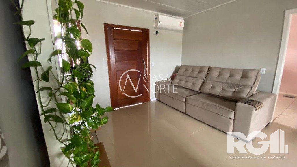 Casa à venda com 2 quartos, 56m², 3 vagas, Rua Seis de Novembro no bairro Mário Quintana em Porto Alegre