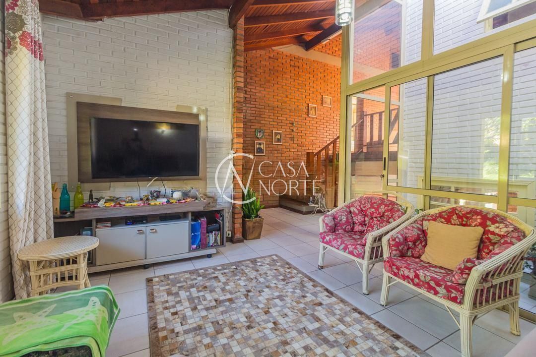 Casa de Condomínio à venda com 4 quartos, 221m², 1 suíte, 2 vagas, Rua Tocantins no bairro Lomba do Pinheiro em Porto Alegre