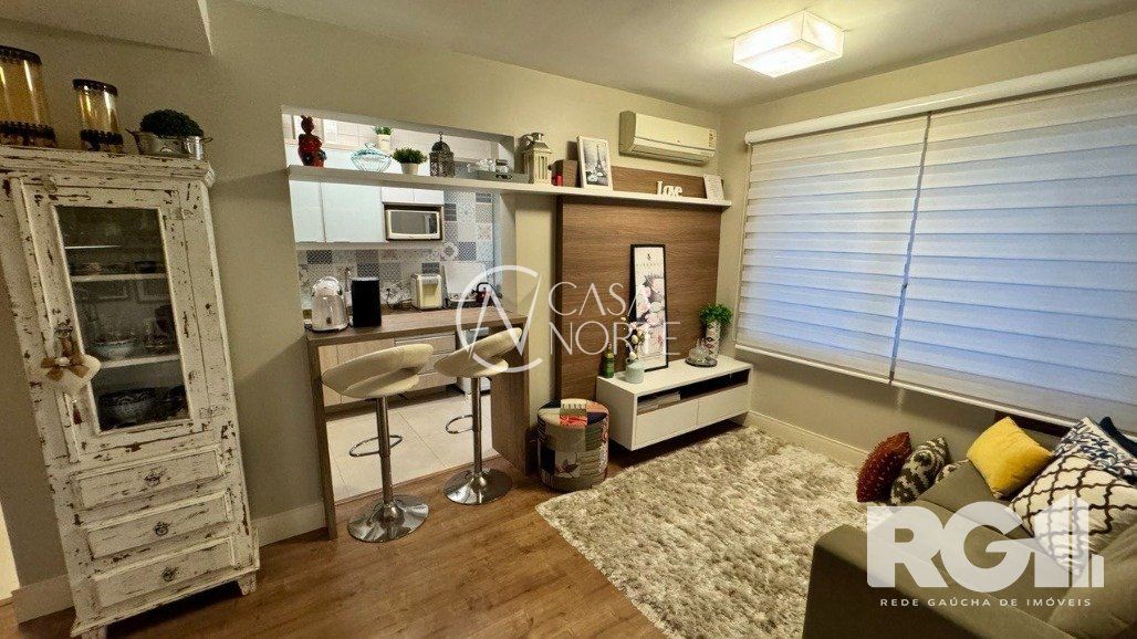 Apartamento à venda com 1 quarto, 52m², 1 suíte, 1 vaga, Avenida Mariland no bairro Auxiliadora em Porto Alegre
