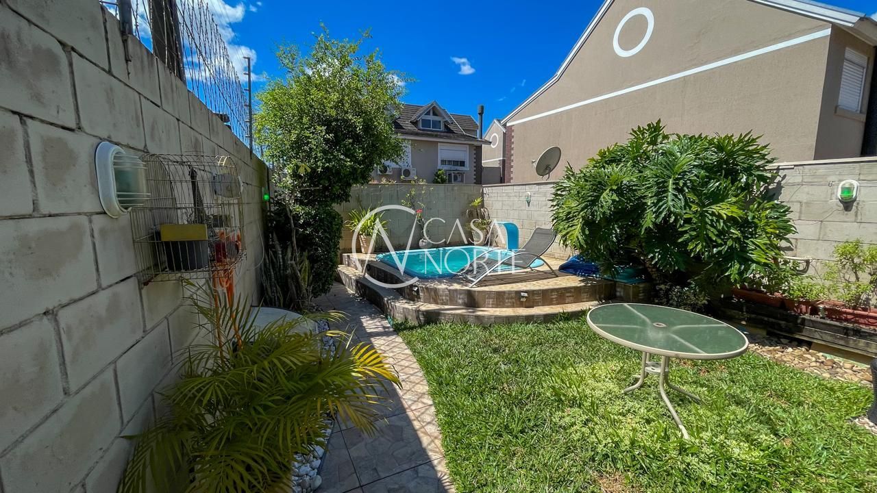 Casa de Condomínio à venda com 4 quartos, 194m², 1 suíte, 2 vagas, Rua Augusto Attílio Giordani no bairro Jardim Lindóia em Porto Alegre