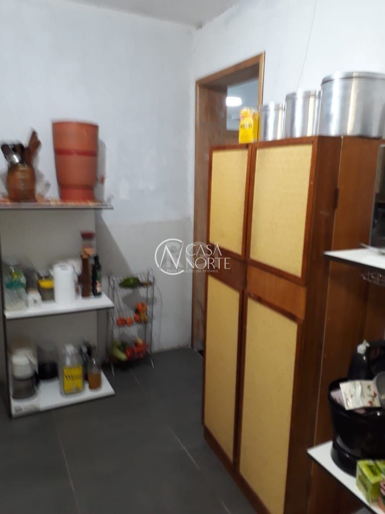 Casa à venda com 4 quartos, 230m², 1 suíte, 3 vagas, Beco Domience Silva no bairro Ponta Grossa em Porto Alegre