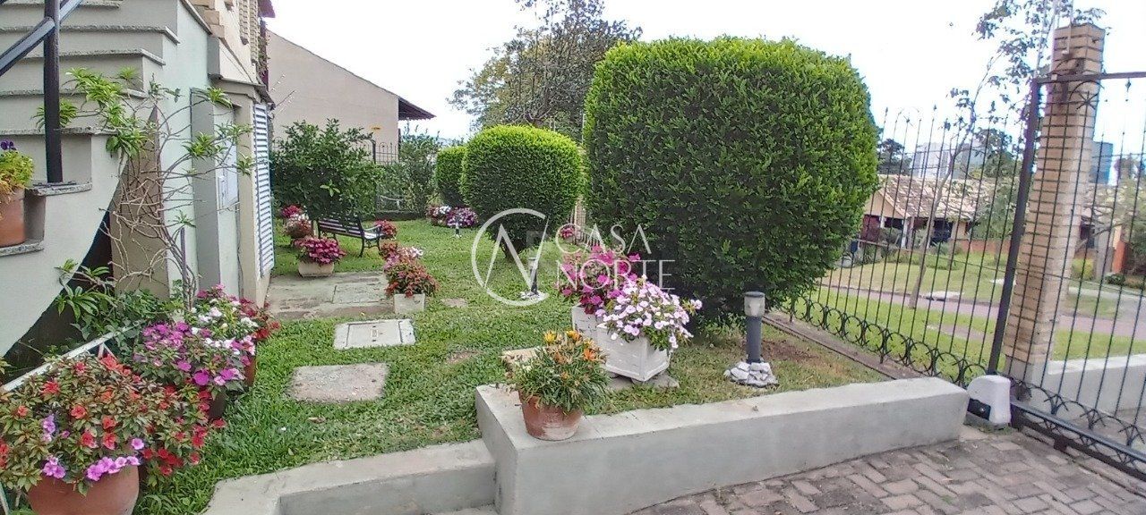 Casa de Condomínio à venda com 3 quartos, 204m², 1 suíte, 2 vagas, Rua Curupaiti no bairro Cristal em Porto Alegre