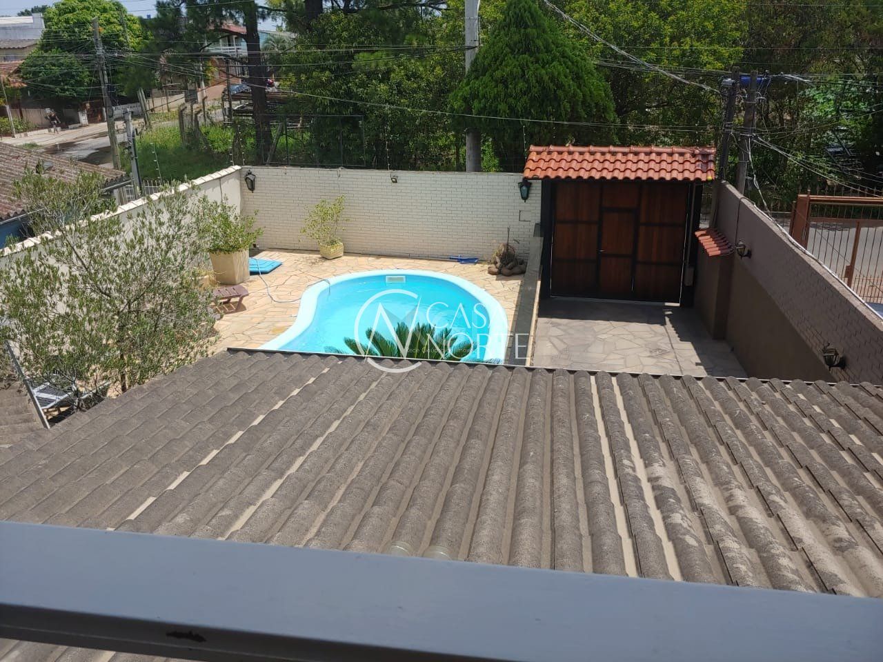 Casa à venda com 3 quartos, 250m², 1 suíte, 5 vagas, Rua João Paris no bairro Santa Rosa de Lima em Porto Alegre