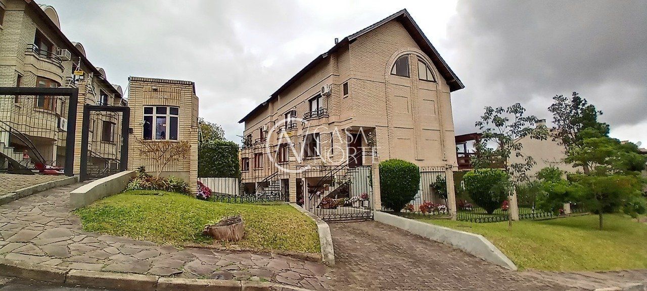 Casa de Condomínio à venda com 3 quartos, 204m², 1 suíte, 2 vagas, Rua Curupaiti no bairro Cristal em Porto Alegre