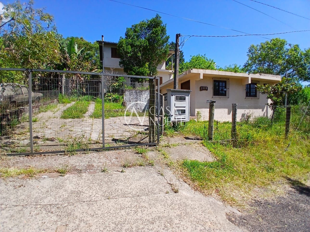 Casa à venda com 5 quartos, 300m², 4 vagas, Estrada das Furnas no bairro Vila Nova em Porto Alegre