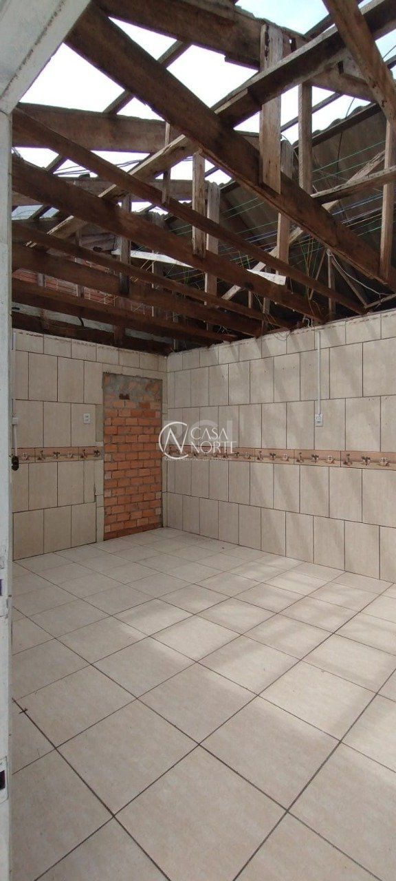 Casa à venda com 7 quartos, 200m², 1 suíte, 5 vagas, Rua Cirilo Leite Torres no bairro Espírito Santo em Porto Alegre