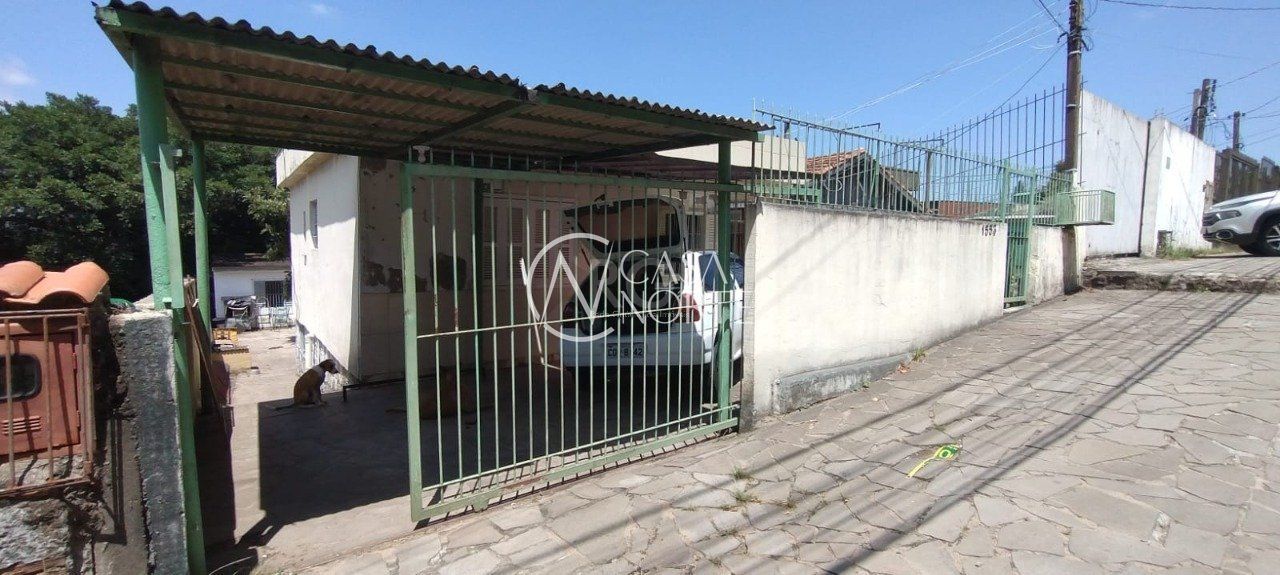 Casa à venda com 4 quartos, 150m², 3 vagas, Avenida Vicente Monteggia no bairro Cavalhada em Porto Alegre