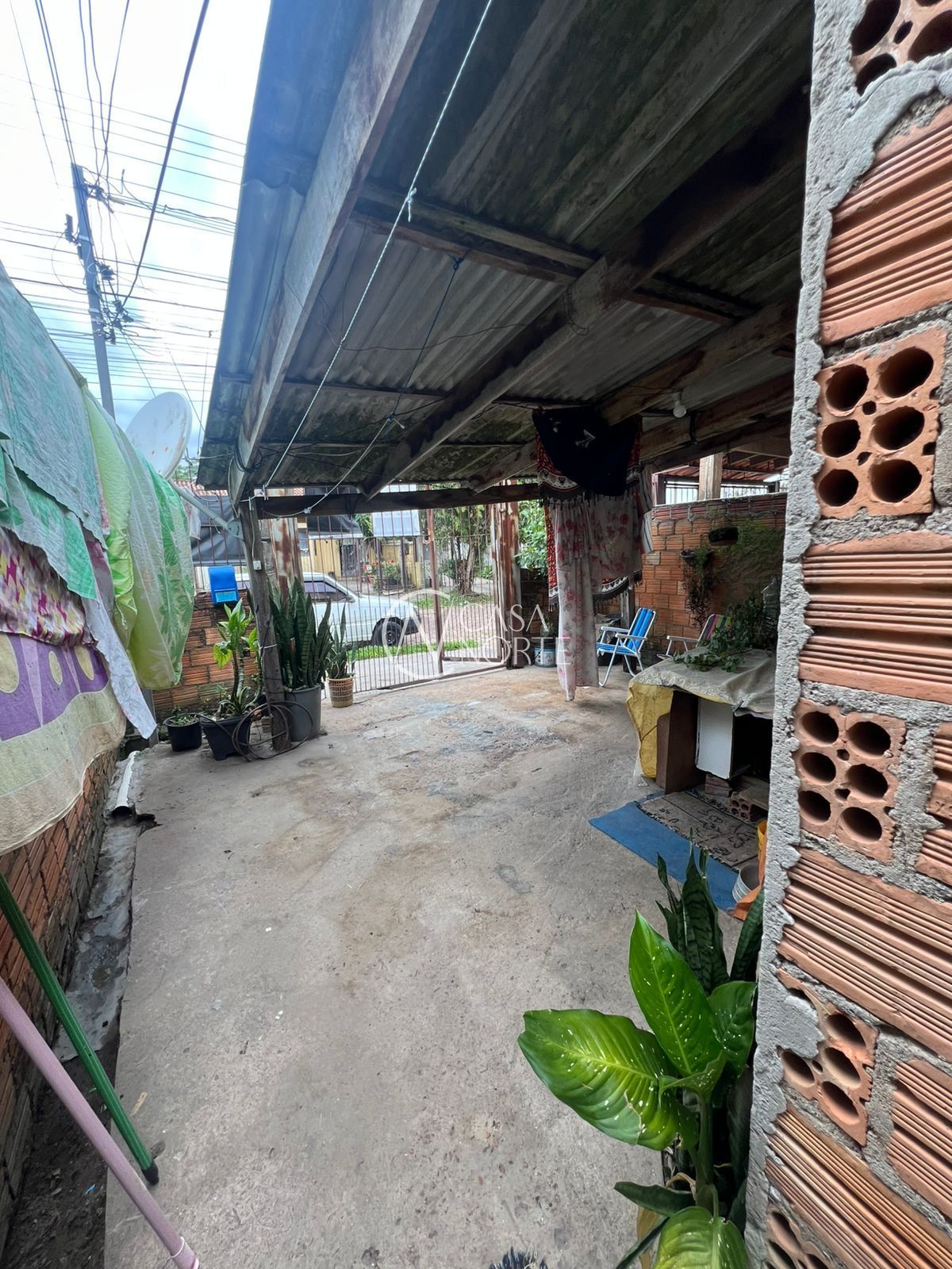 Casa à venda com 2 quartos, 63m², 1 vaga, Rua Mário Vieira Marques no bairro Hípica em Porto Alegre