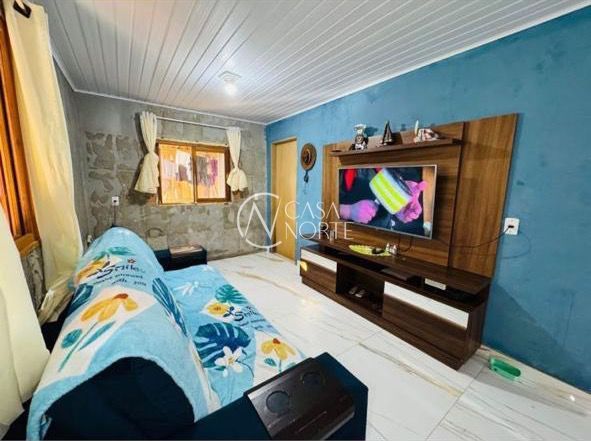 Casa à venda com 3 quartos, 60m², 2 vagas, Beco Calábria no bairro Restinga em Porto Alegre