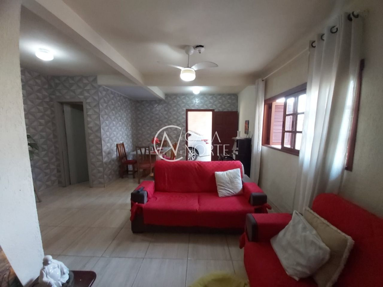 Casa à venda com 3 quartos, 100m², 1 suíte, 3 vagas, Rua Império no bairro Vila Nova em Porto Alegre