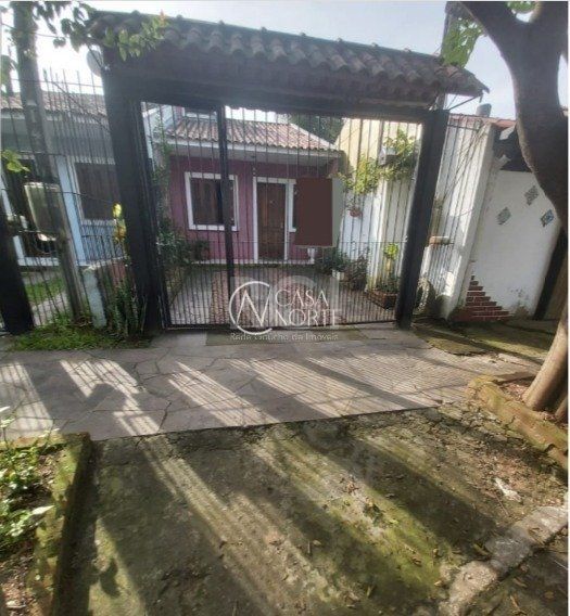 Casa à venda com 2 quartos, 63m², 2 vagas, Rua Elmo Born no bairro Hípica em Porto Alegre