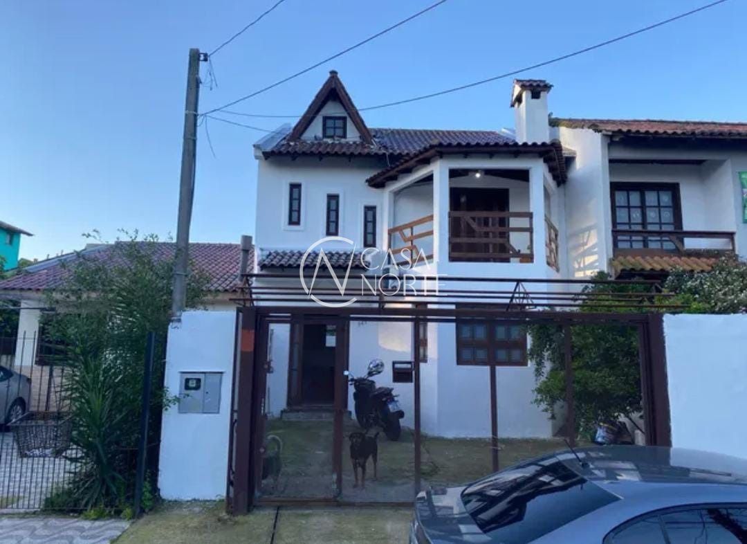 Casa à venda com 3 quartos, 299m², 1 suíte, 2 vagas, Rua Raffaele Nigro no bairro Hípica em Porto Alegre