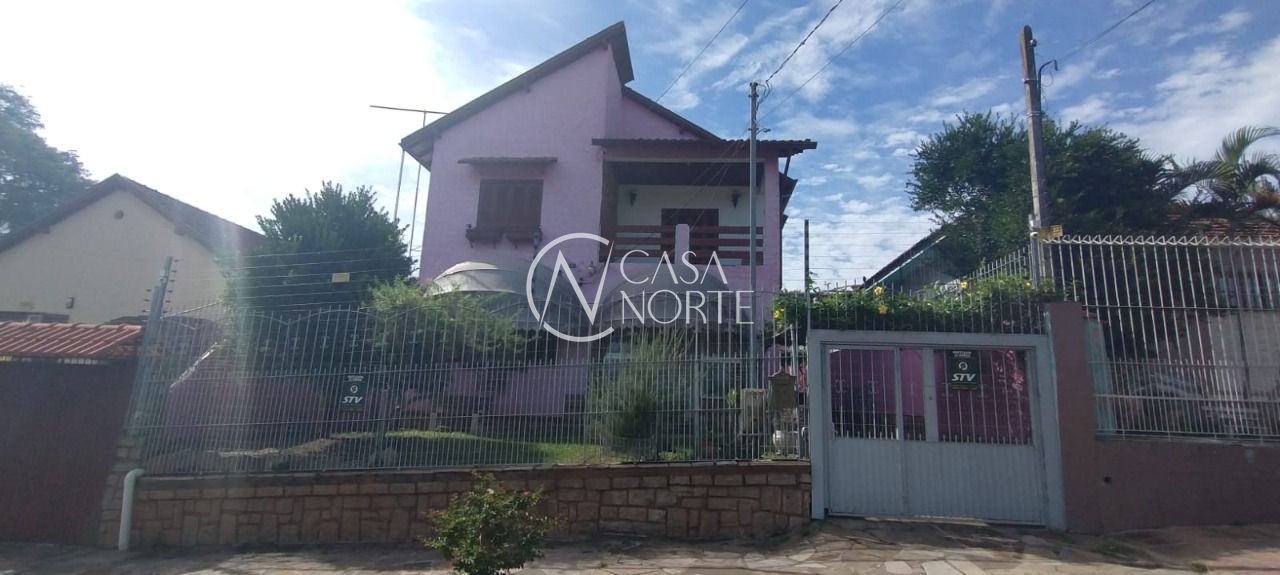 Casa à venda com 5 quartos, 206m², 1 suíte, 4 vagas, Rua Januário Scalzilli no bairro Santa Tereza em Porto Alegre