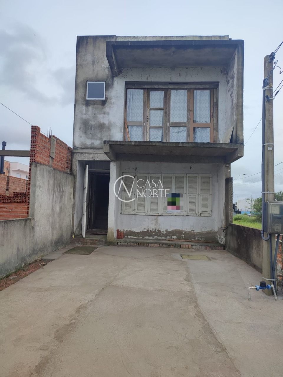 Sobrado à venda com 3 quartos, 124m², 1 suíte, 2 vagas, Avenida Alcibiades Martins da Rocha no bairro Aberta dos Morros em Porto Alegre
