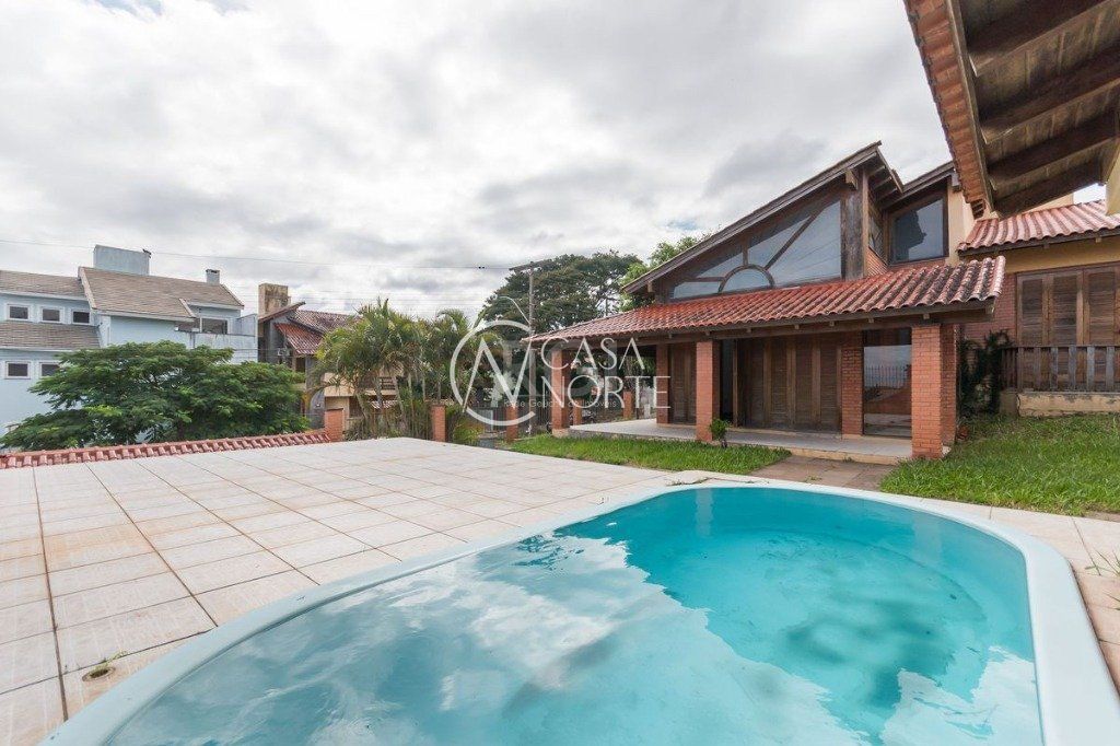 Casa à venda com 3 quartos, 302m², 1 suíte, 2 vagas, Rua Kyve T. Knijnik no bairro Espírito Santo em Porto Alegre