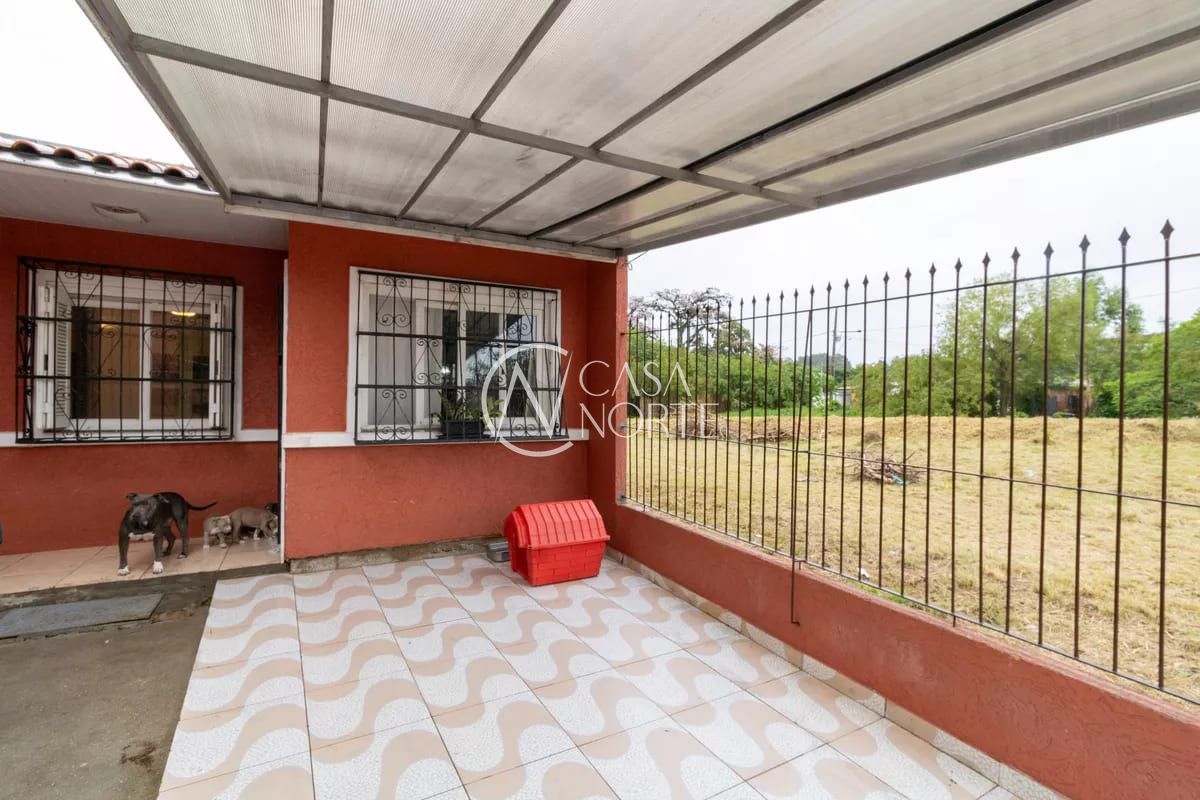 Casa à venda com 3 quartos, 76m², 2 vagas, Rua Seno Antônio Cornely no bairro Hípica em Porto Alegre