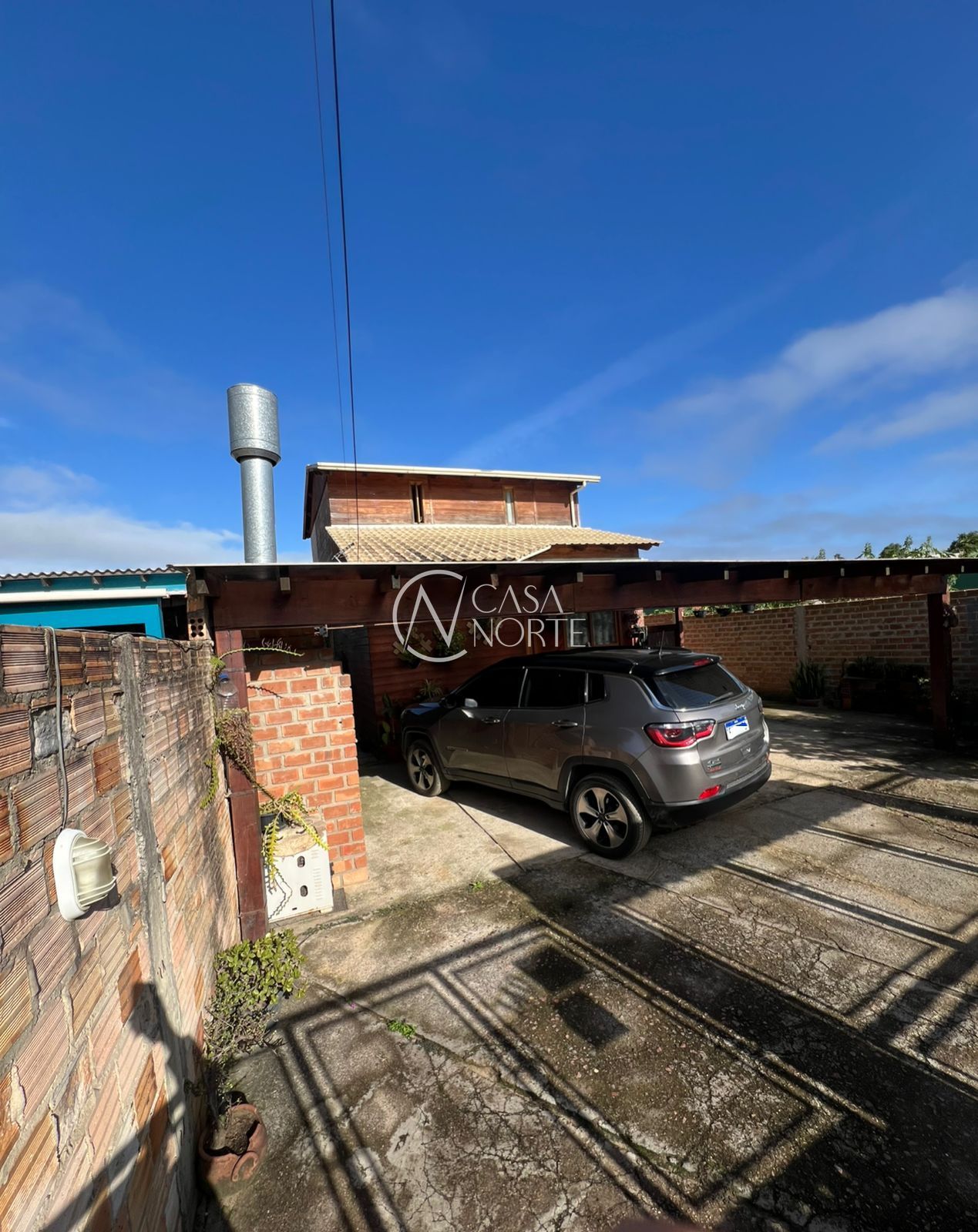 Casa à venda com 2 quartos, 120m², 1 suíte, 3 vagas, Rua Ipê-Roxo no bairro Restinga em Porto Alegre