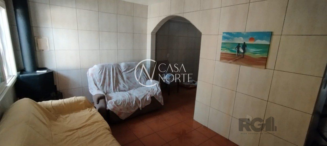 Casa à venda com 3 quartos, 125m², 1 vaga, Rua Dorival Leivas no bairro Hípica em Porto Alegre