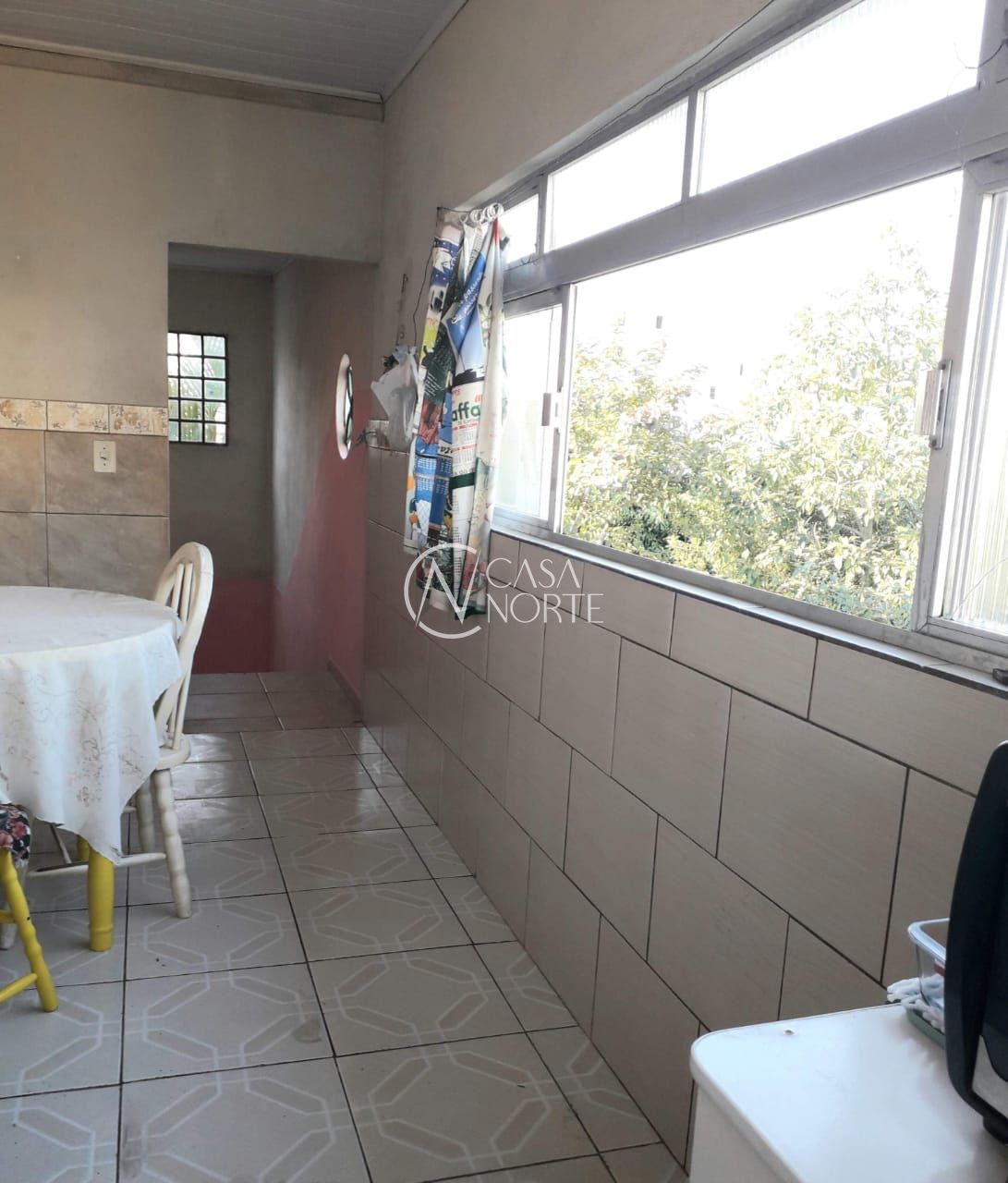 Casa à venda com 3 quartos, 100m², 2 vagas, Rua Sete Mil e Três no bairro Restinga em Porto Alegre