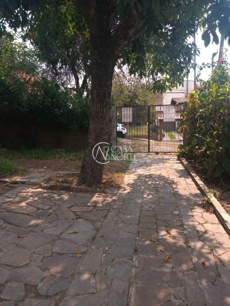 Casa à venda com 4 quartos, 150m², 2 vagas, Rua Marquês do Maricá no bairro Vila Nova em Porto Alegre