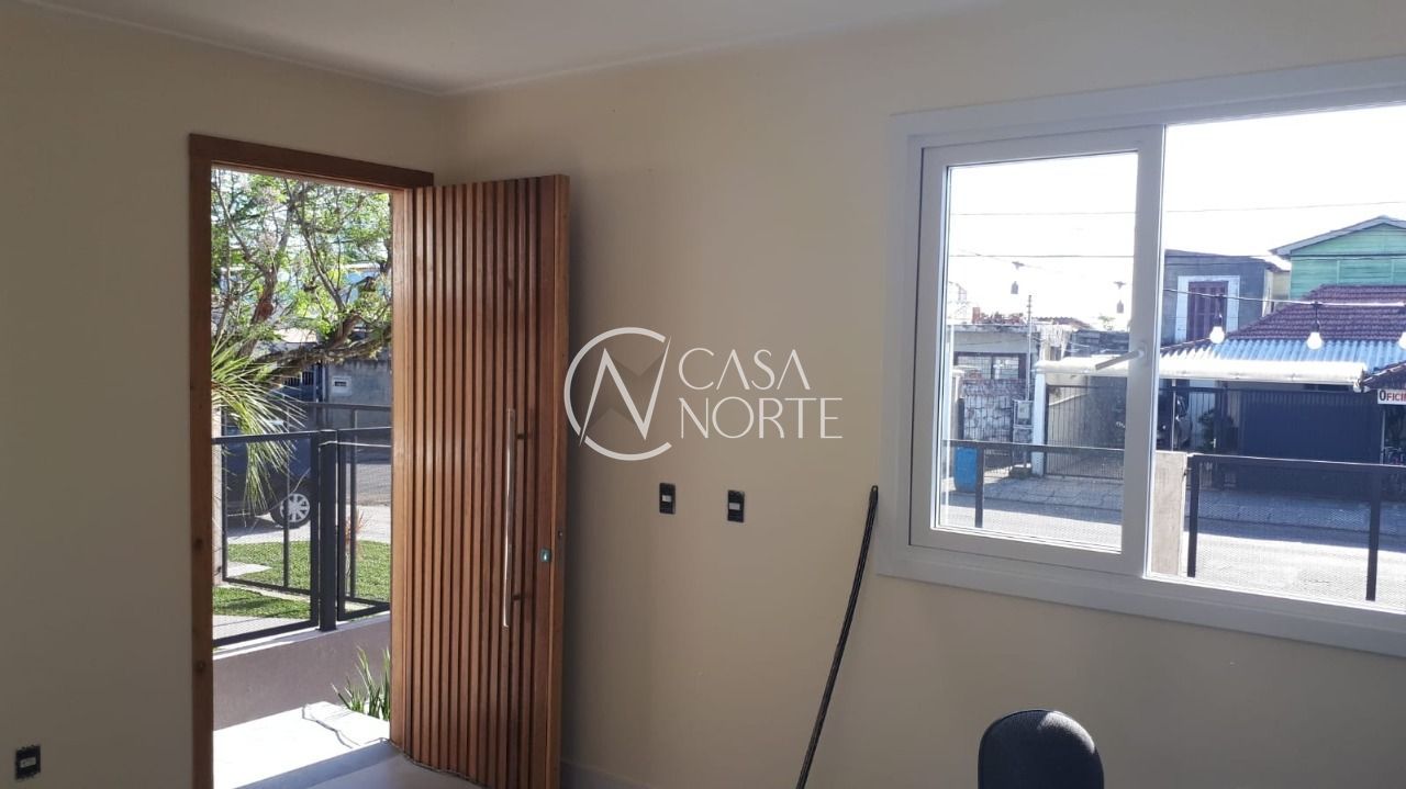 Casa à venda com 3 quartos, 69m², 1 suíte, 2 vagas, Rua Criciúma no bairro Guarujá em Porto Alegre