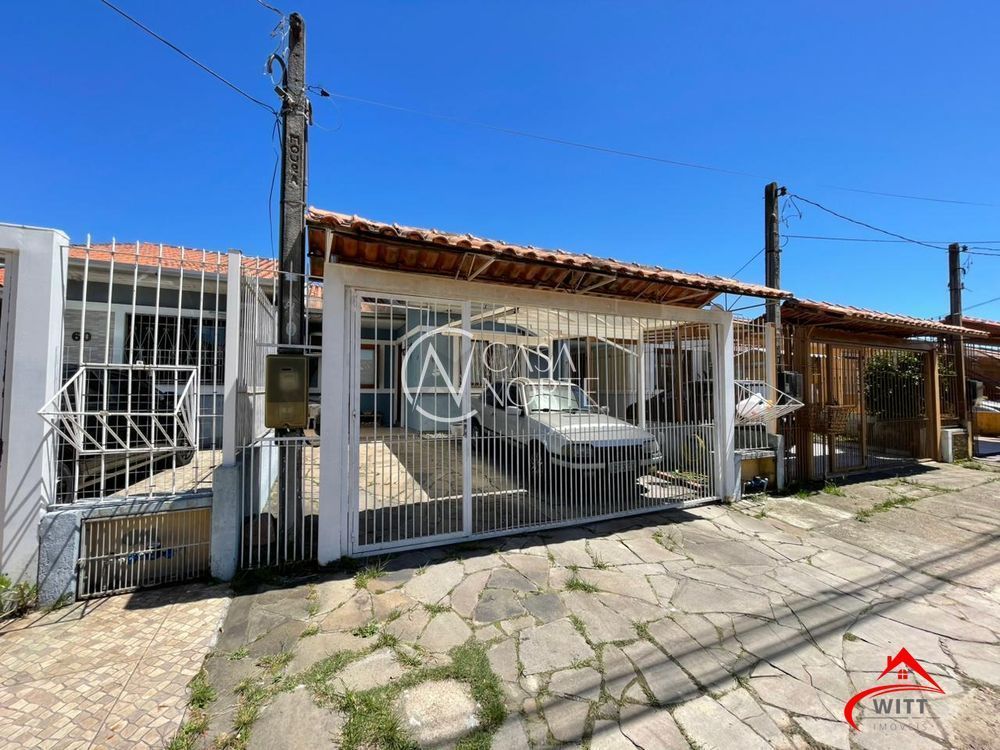 Casa à venda com 3 quartos, 75m², 2 vagas, Rua Darcy de Bastos Germann no bairro Hípica em Porto Alegre