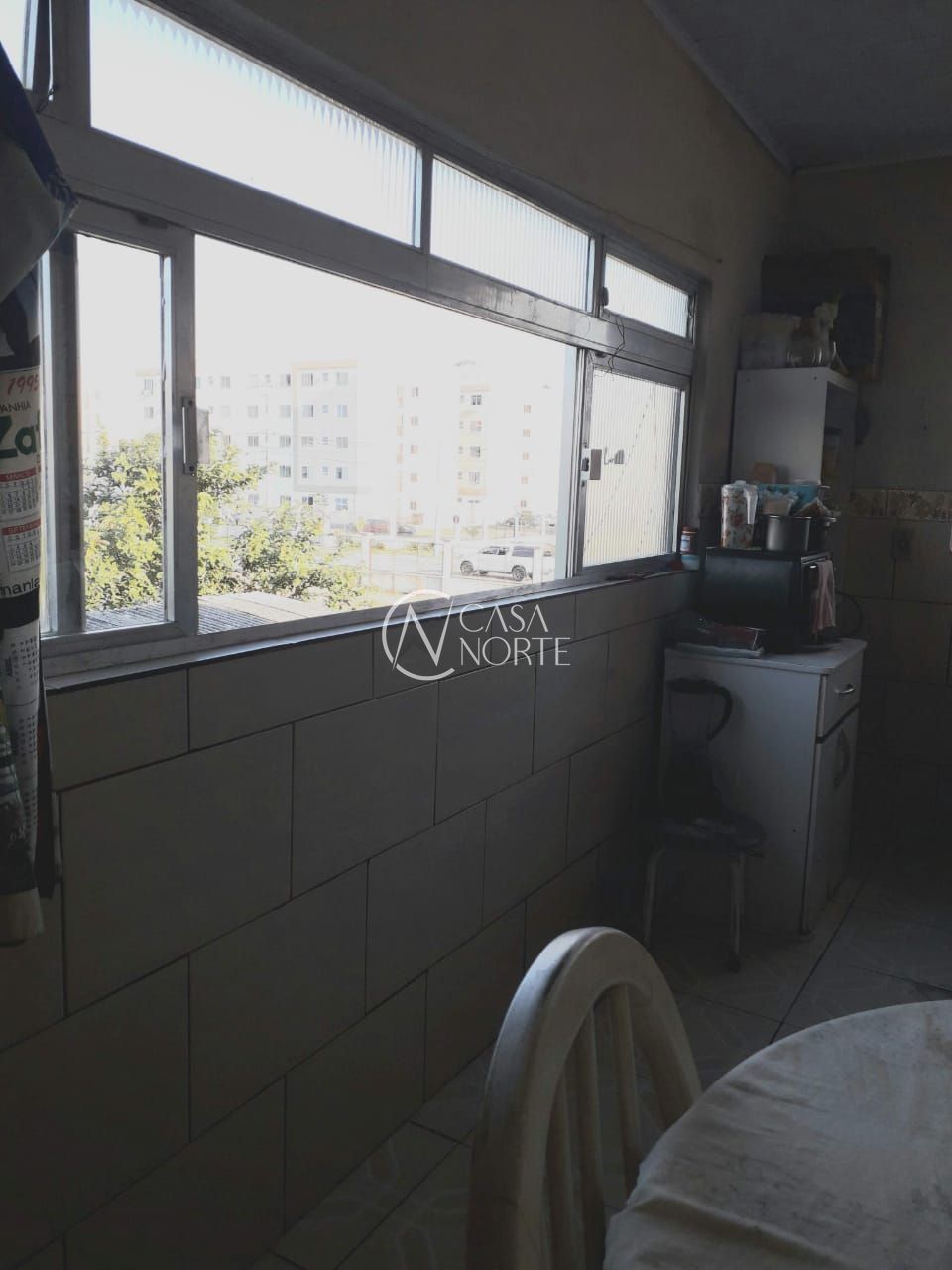 Casa à venda com 3 quartos, 100m², 2 vagas, Rua Sete Mil e Três no bairro Restinga em Porto Alegre