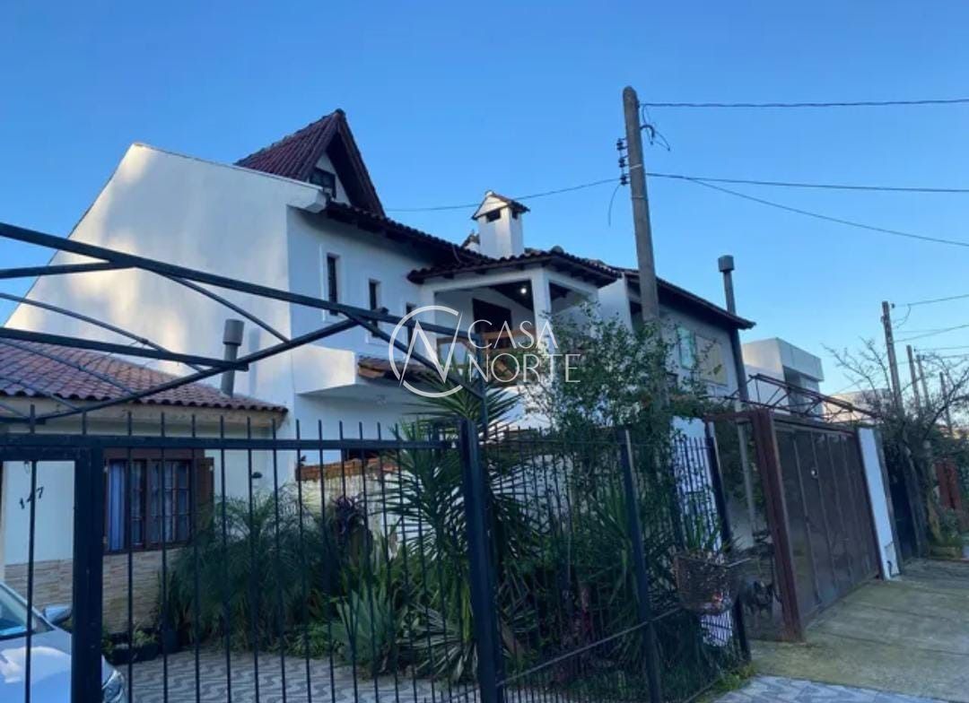 Casa à venda com 3 quartos, 299m², 1 suíte, 2 vagas, Rua Raffaele Nigro no bairro Hípica em Porto Alegre