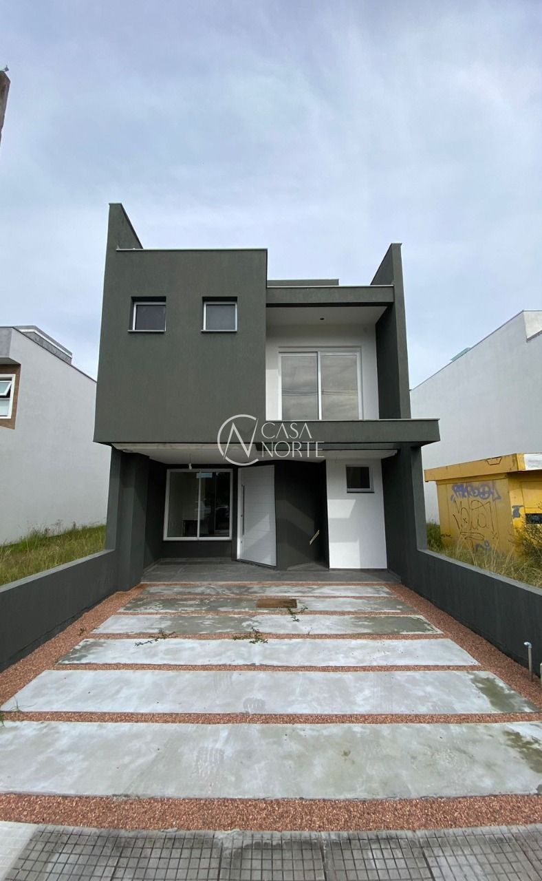 Casa à venda com 3 quartos, 224m², 3 suítes, 2 vagas, Rua Marco Túlio Kalil Ferreyro no bairro Aberta dos Morros em Porto Alegre